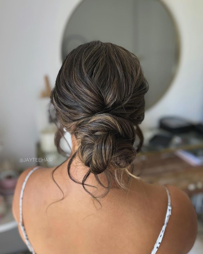 Messy Bun with Loose Strands