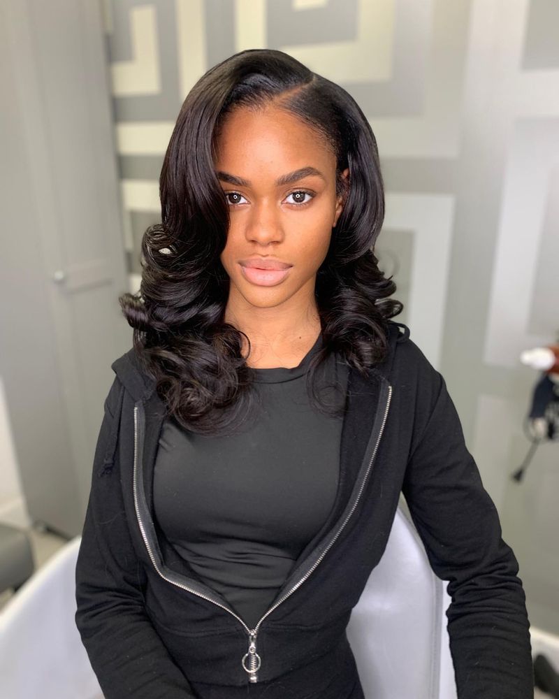 Voluminous Curls with Deep Side Part